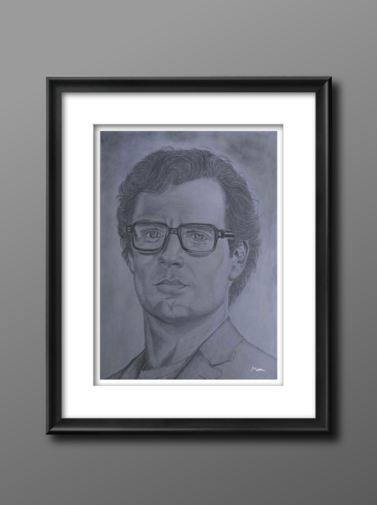 A framed grayscale pencil portrait of a man with short, styled hair wearing glasses and a suit. The artwork is displayed against a neutral gray background. The man’s facial expression is serious, and the detailed shading adds depth to the image.